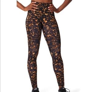 Sweaty Betty Size Small Tortoise Shell Zero Gravity Pocket 7/8 Leggings Pants
